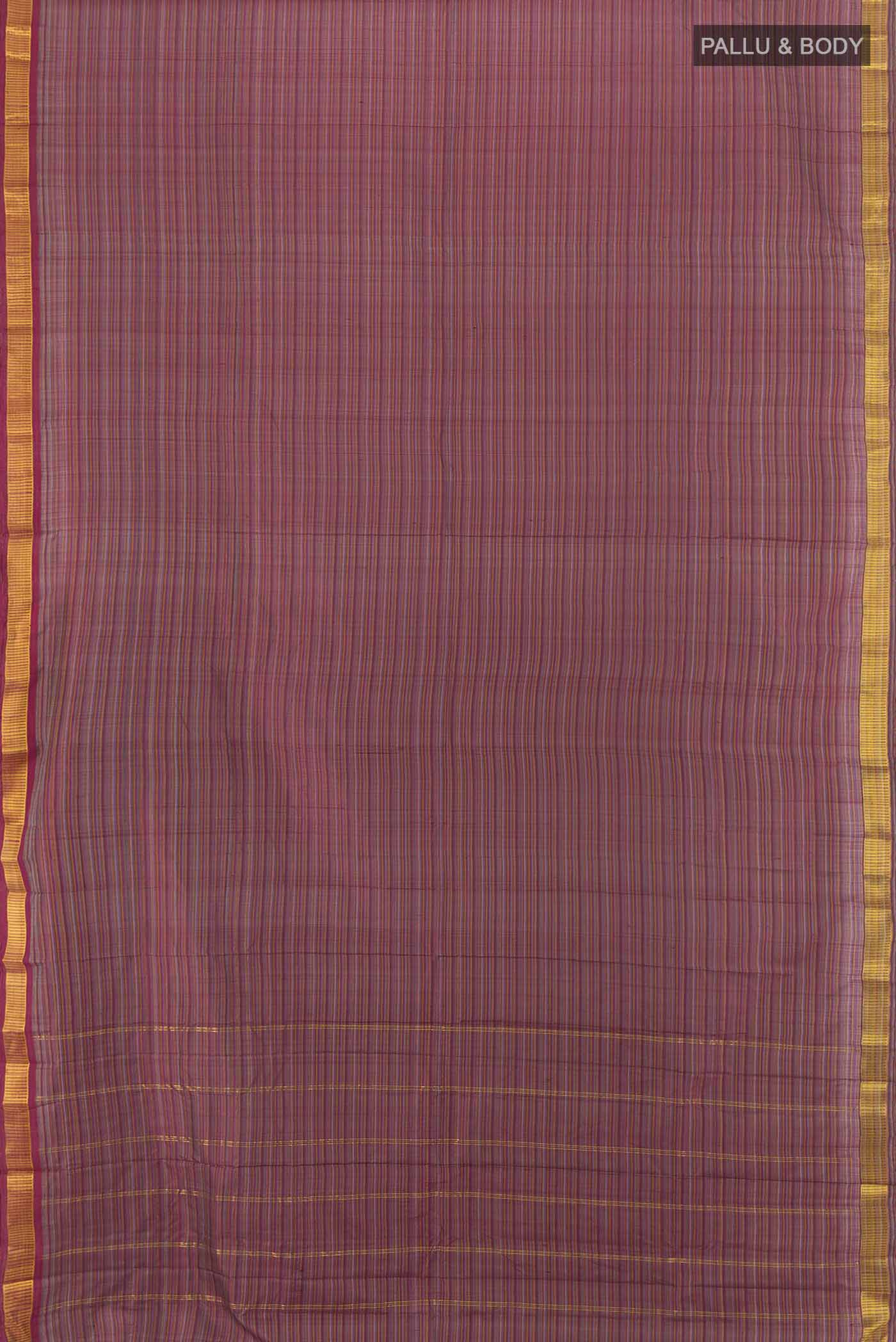 Flat view of Multi Color Kanjivaram Silk Saree with Zari Butta on the body and Silk Border. 
