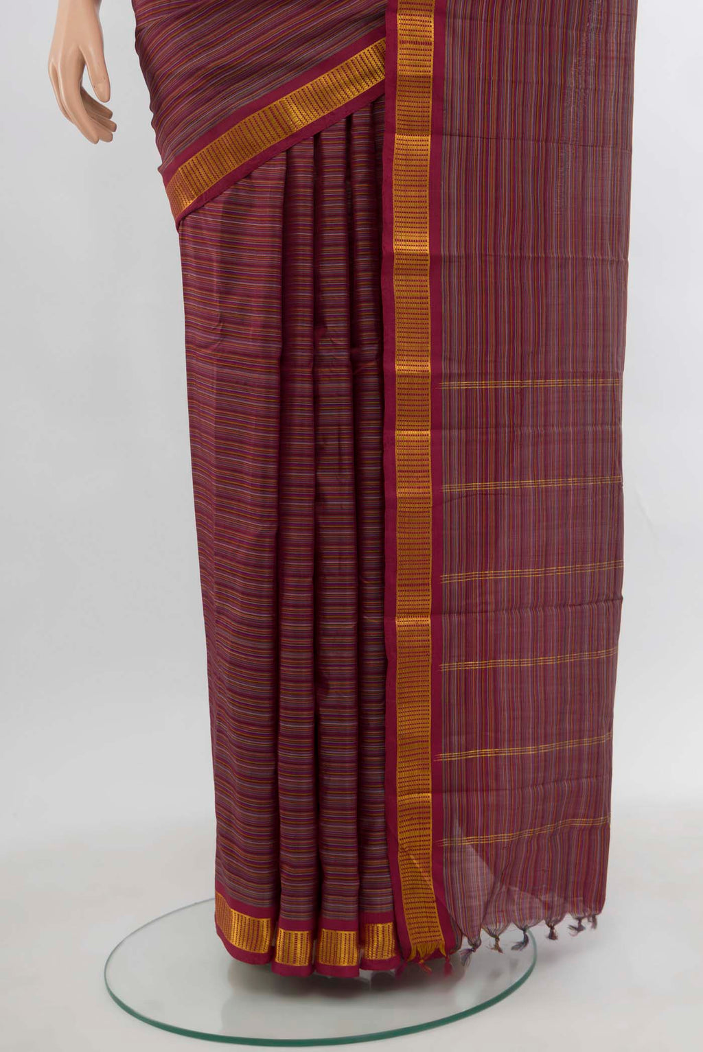 Pleats and pallu of Multi Color Kanjivaram Silk Saree with Zari Butta on the body and Silk Border. 
