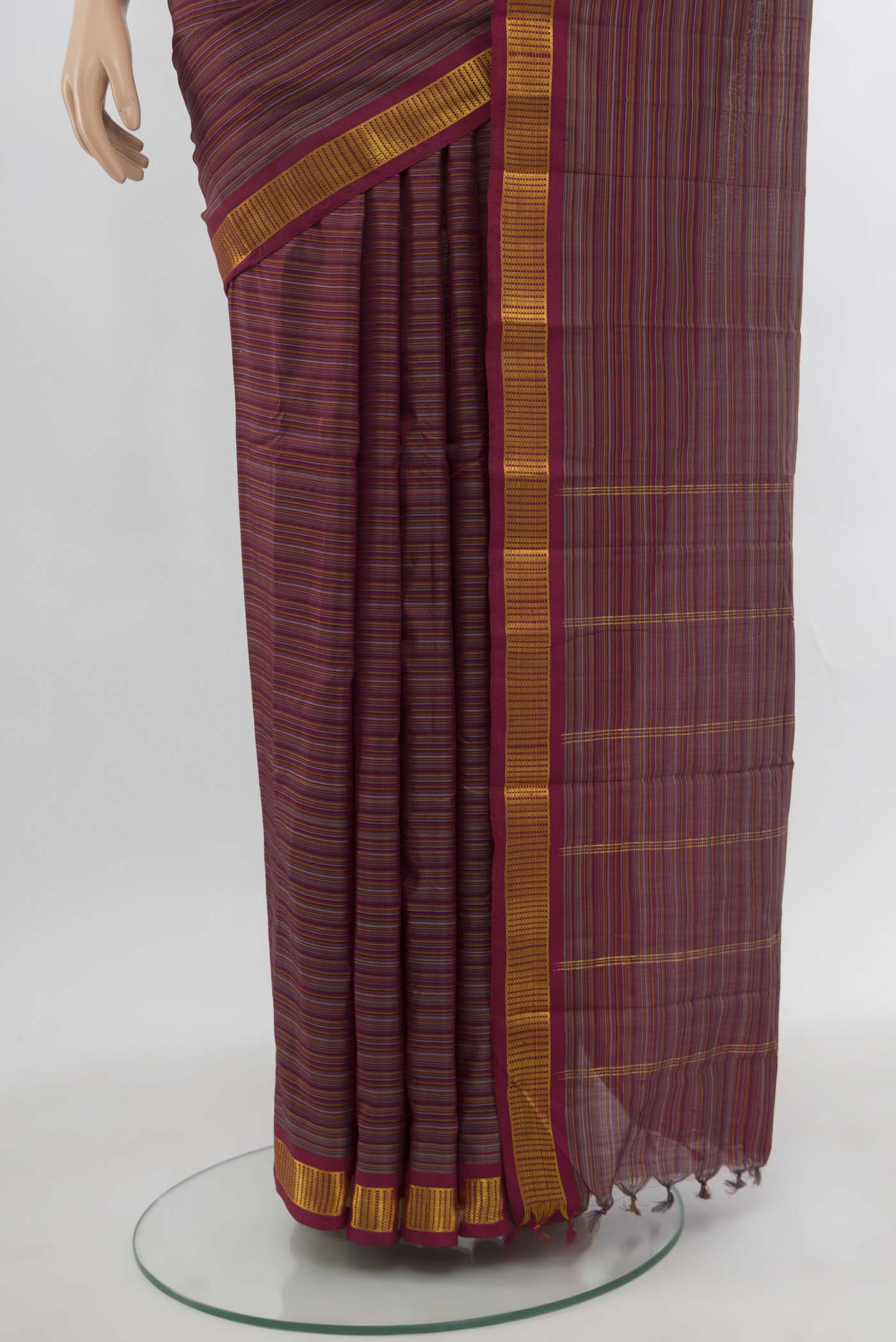 Pleats and pallu of Multi Color Kanjivaram Silk Saree with Zari Butta on the body and Silk Border. 