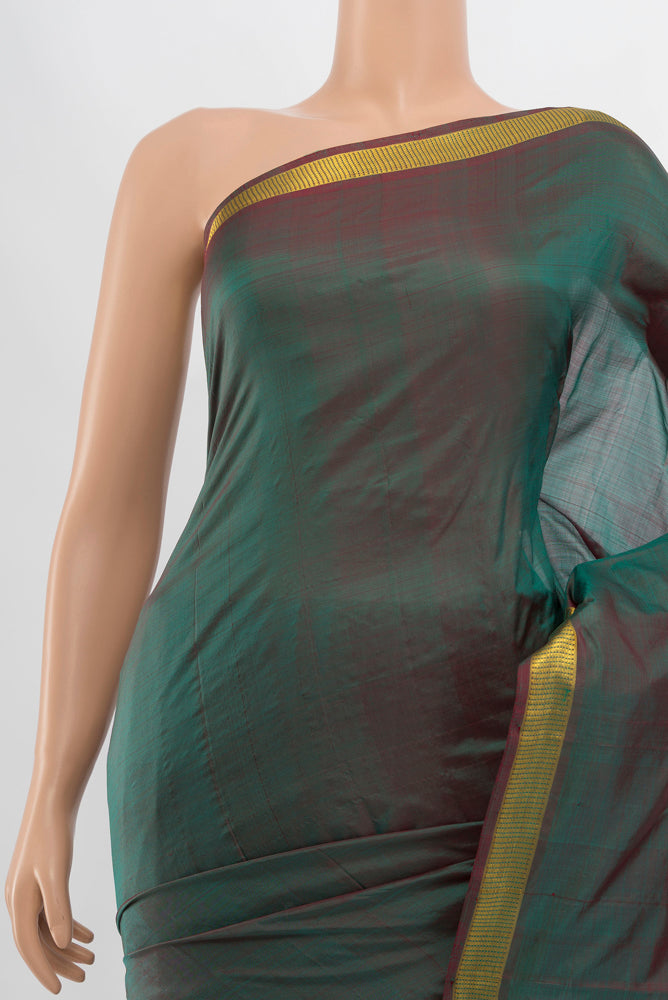 Border image of Mehandi Green Kanjivaram Silk Saree with Zari Butta on the body and Silk Border. 