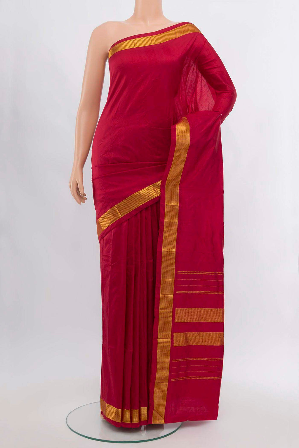 Maroon Kanjivaram Silk Saree with Plain Body and Silk Border.  displayed on a mannequin