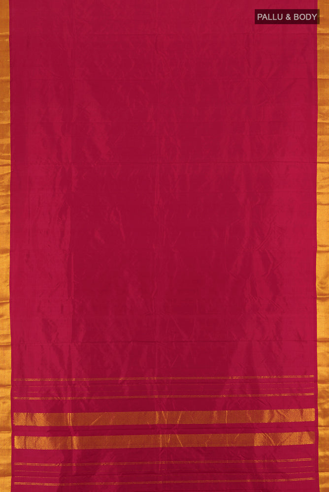 Flat view of Maroon Kanjivaram Silk Saree with Plain Body and Silk Border. 