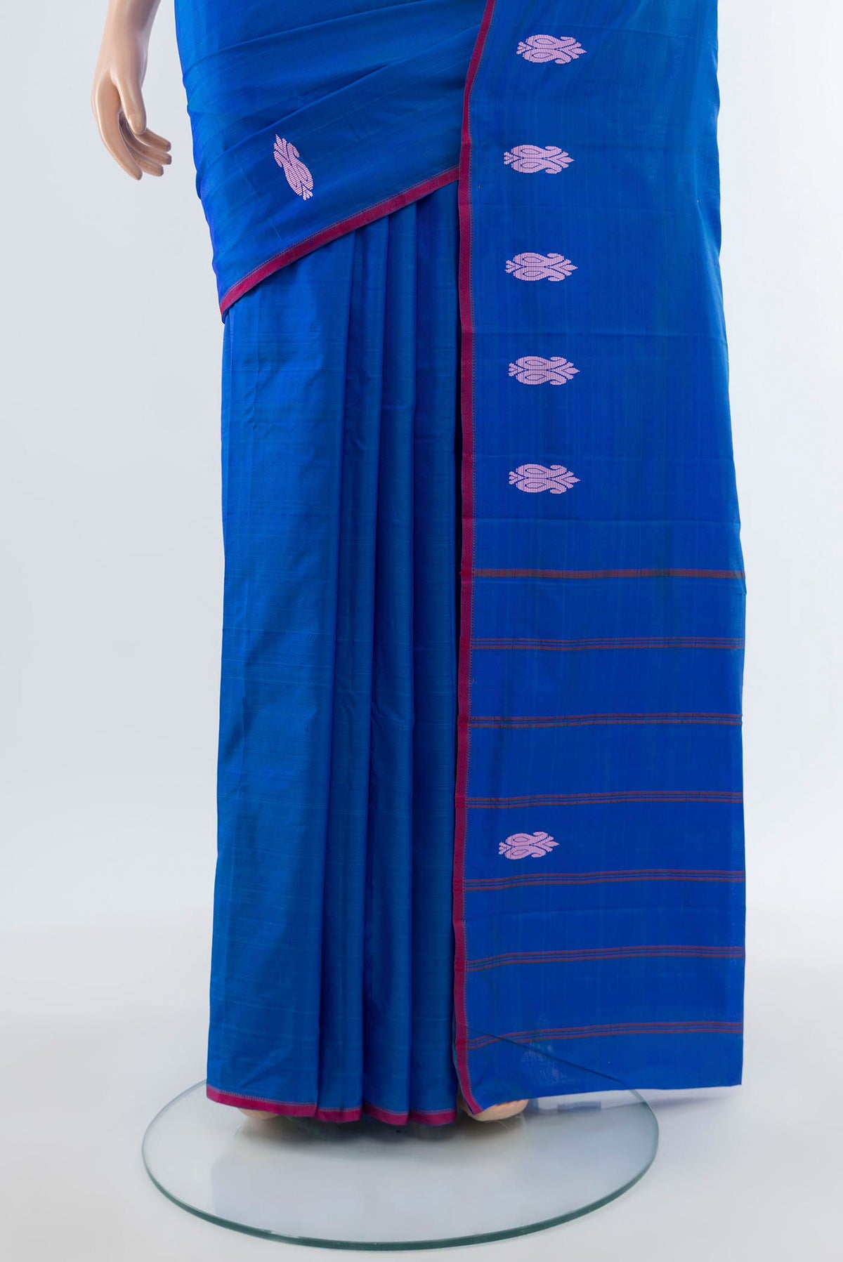 Pleats and pallu of Royal Blue Kanchipuram Silk Saree with Plain Body and Thread Border. 