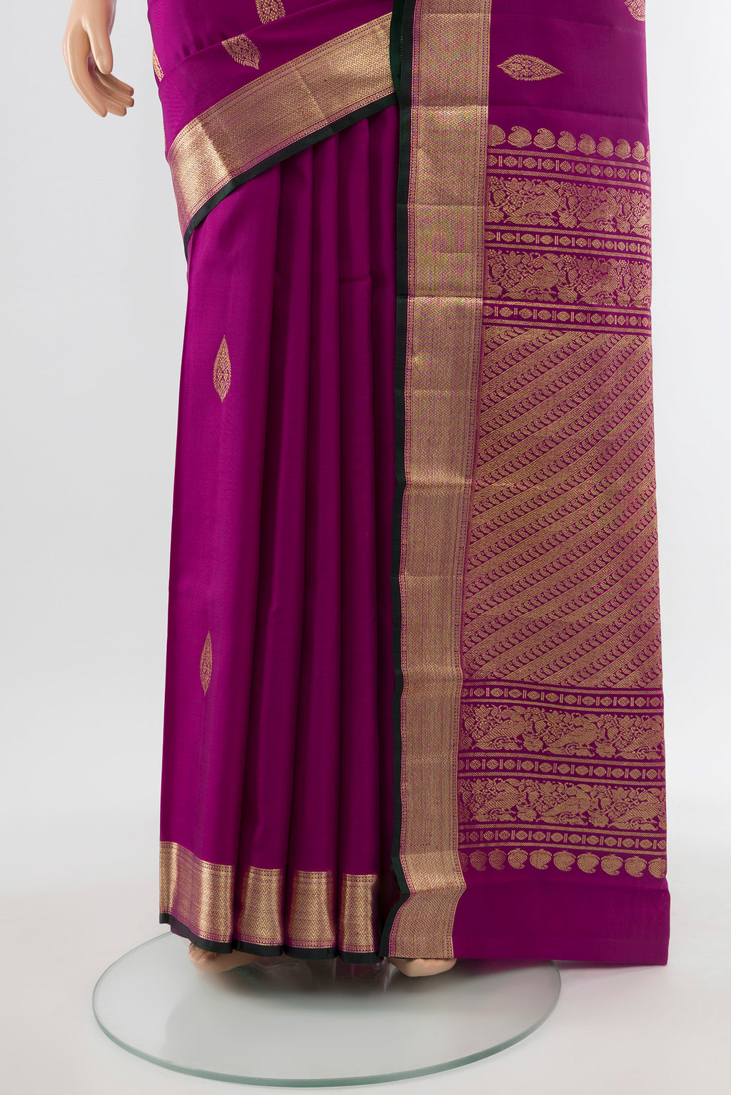 Pleats and pallu of Pure Silk Pure Zari Purple Kanjivaram Saree with Zari Butta on the body and Silk Border. 