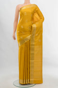 Yellow Kanjivaram Silk Saree with Zari Butta on the body and Silk Border.  displayed on a mannequin