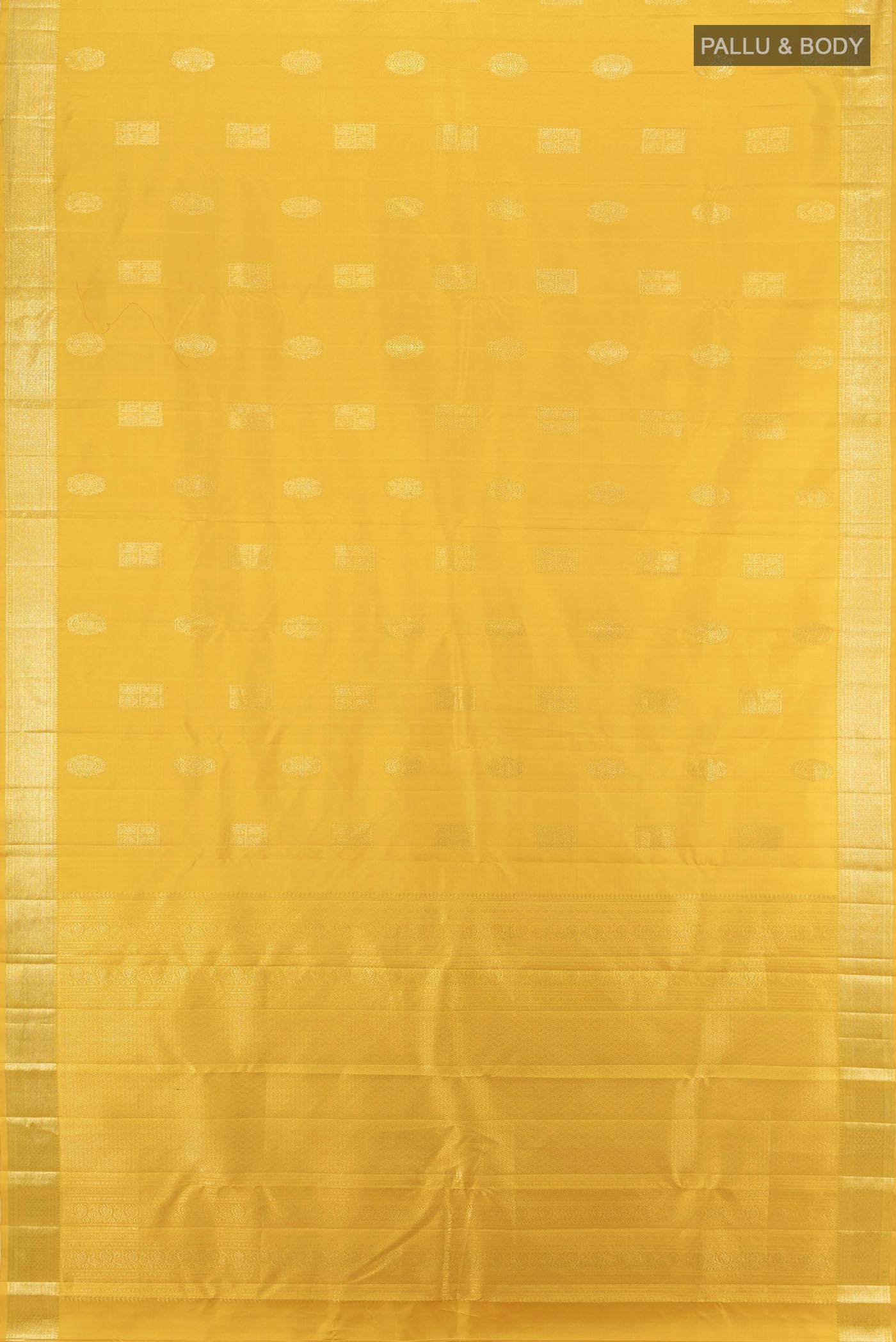 Flat view of Yellow Kanjivaram Silk Saree with Zari Butta on the body and Silk Border. 