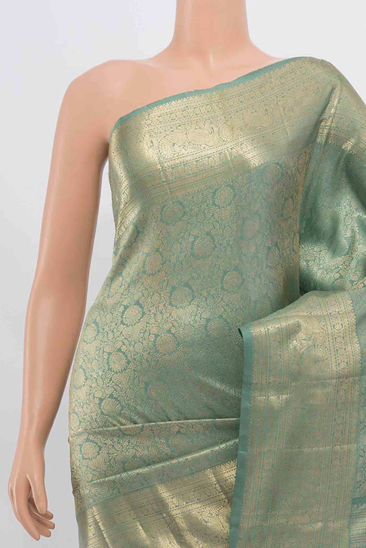 Border image of Mint Green Kanchipuram Silk Saree with Zari Butta on the body and Silk Border. 