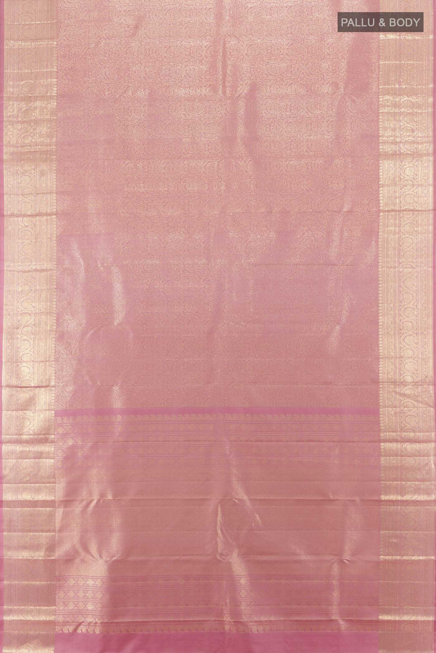 Flat view of Golden Peach Kanchipuram Silk Saree with Zari Butta on the body and Silk Border. 