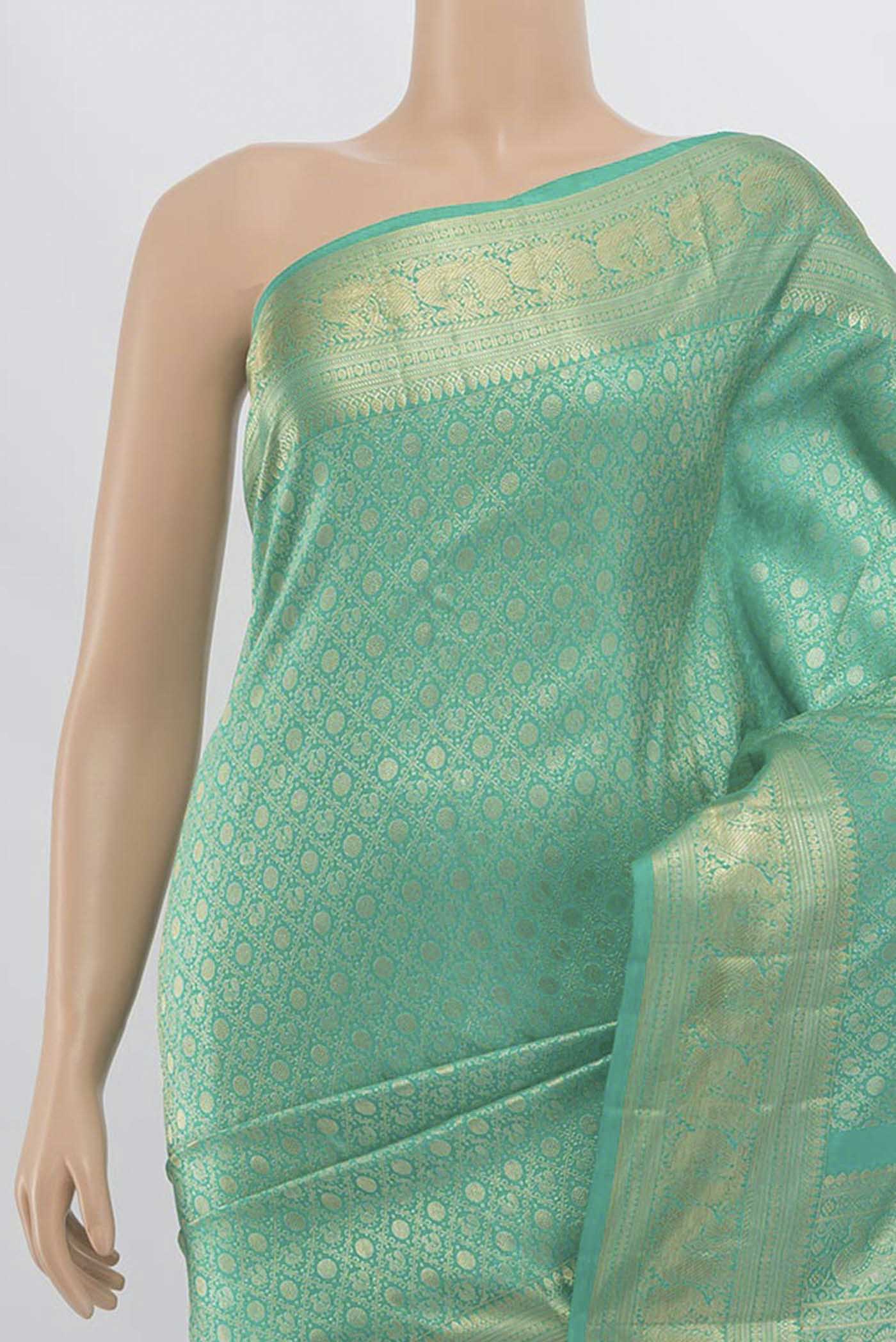 Border image of Sea Green Kanchipuram Silk Saree with Zari Butta on the body and Silk Border. 