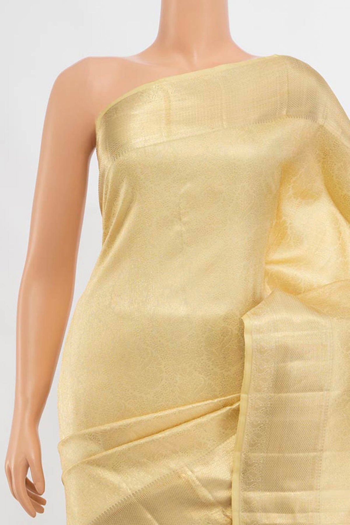 Border image of Cream Kanchipuram Silk Saree with Zari Butta on the body and Silk Border. 