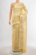 Cream Kanchipuram Silk Saree with Zari Butta on the body and Silk Border.  displayed on a mannequin