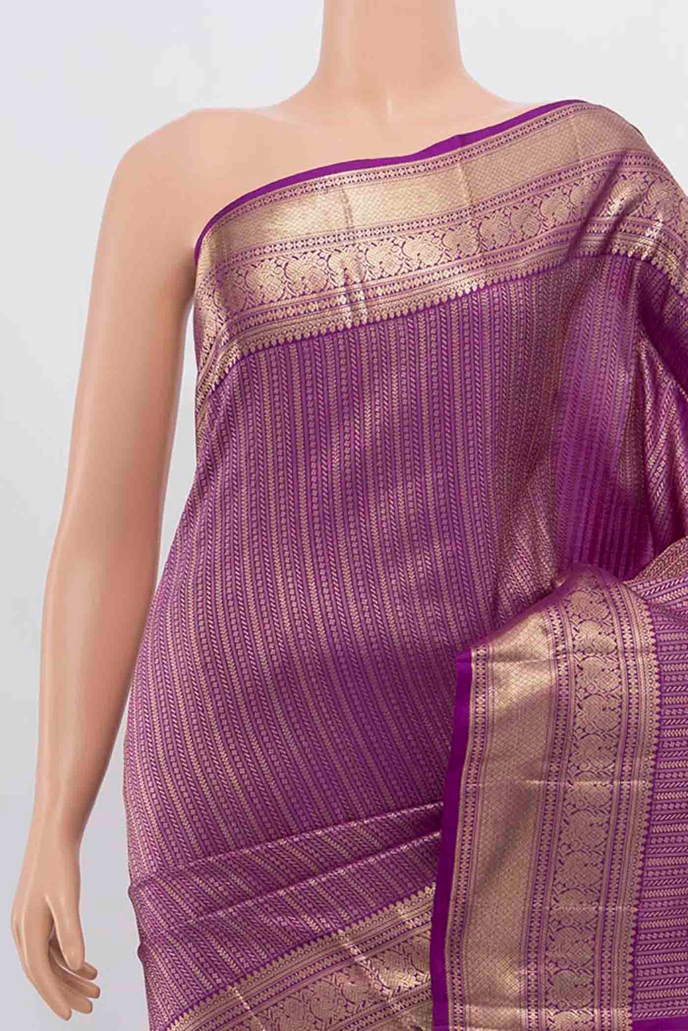 Border image of Violet Kanchipuram Silk Saree with Zari Butta on the body and Silk Border. 