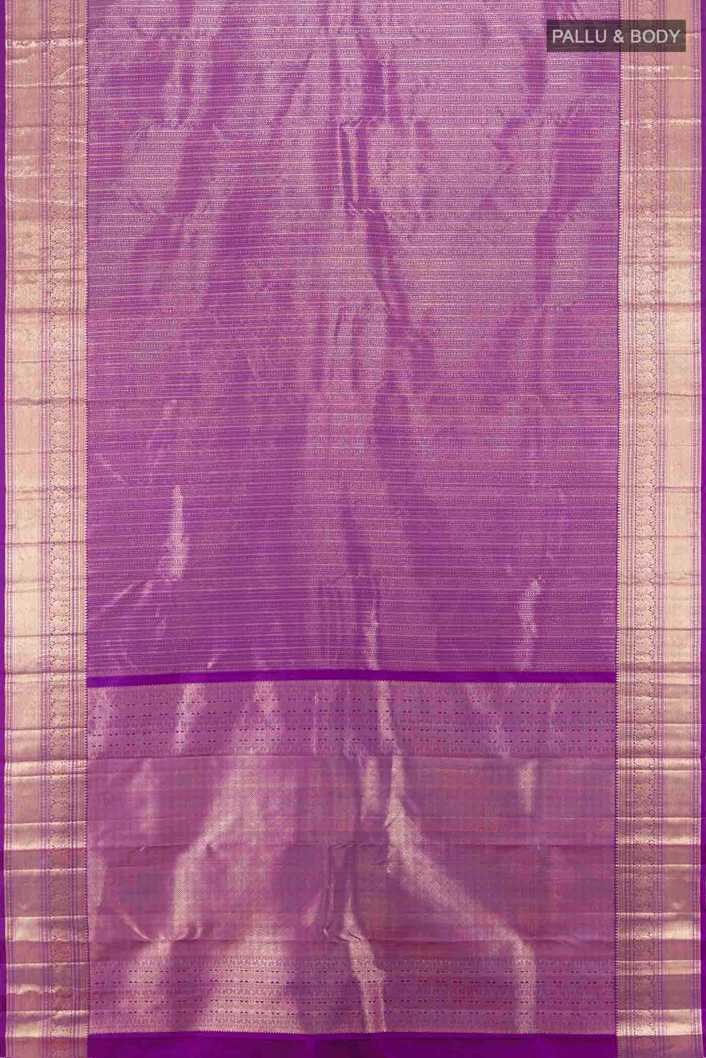 Flat view of Violet Kanchipuram Silk Saree with Zari Butta on the body and Silk Border. 