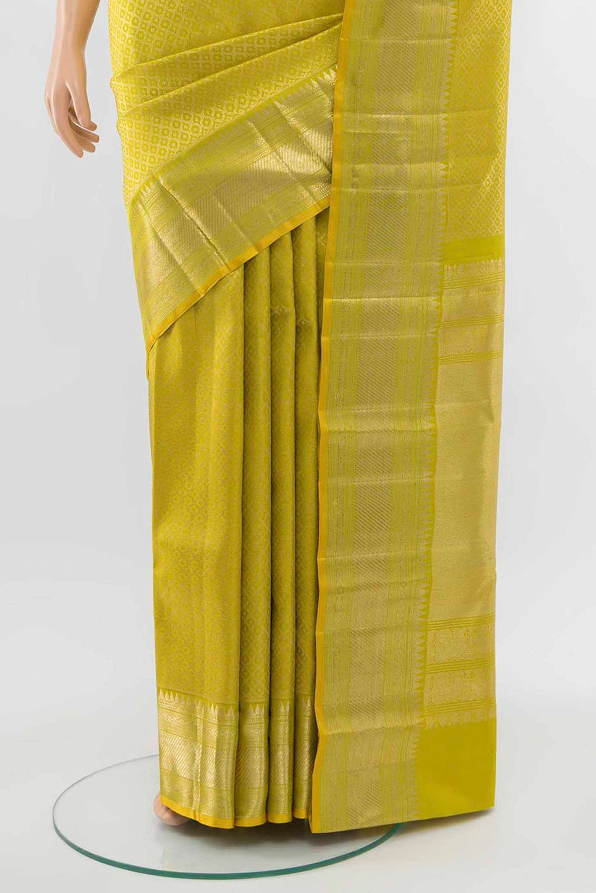 Pleats and pallu of Pista Green Kanchipuram Silk Saree with Zari Butta on the body and Silk Border
