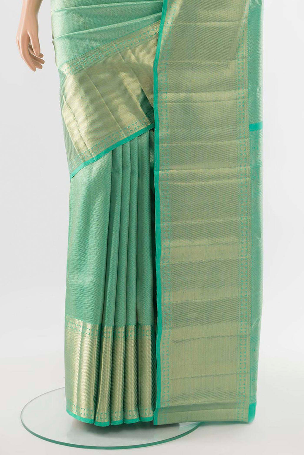 Pleats and pallu of Sea Green Kanchipuram Silk Saree with Zari Butta on the body and Silk Border. 