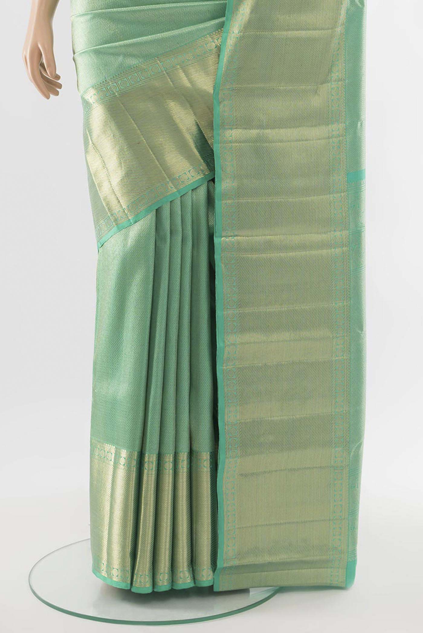 Pleats and pallu of Sea Green Kanchipuram Silk Saree with Zari Butta on the body and Silk Border. 