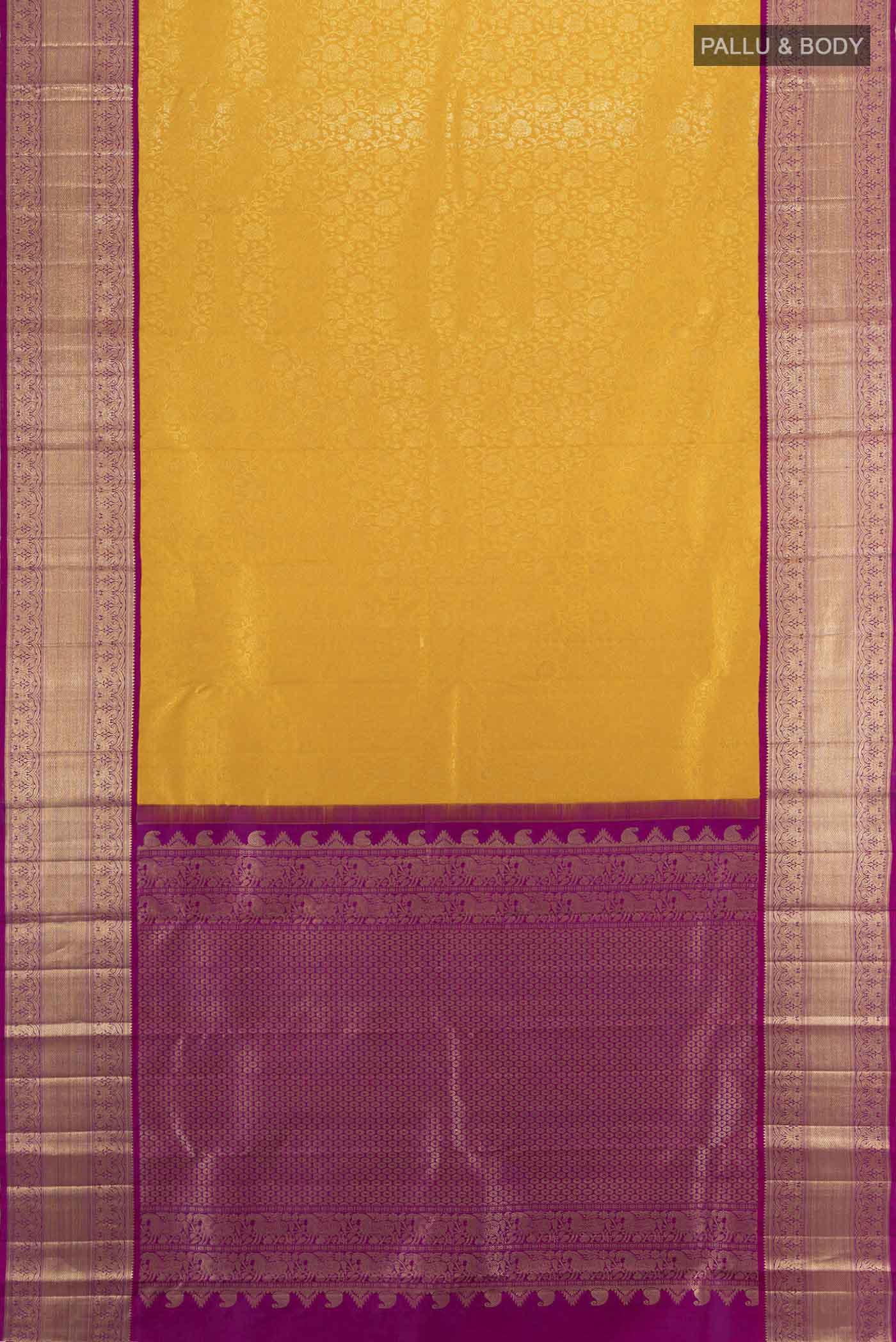 Flat view of Yellow Kanchipuram Silk Saree with Zari Butta on the body and Silk Border. 