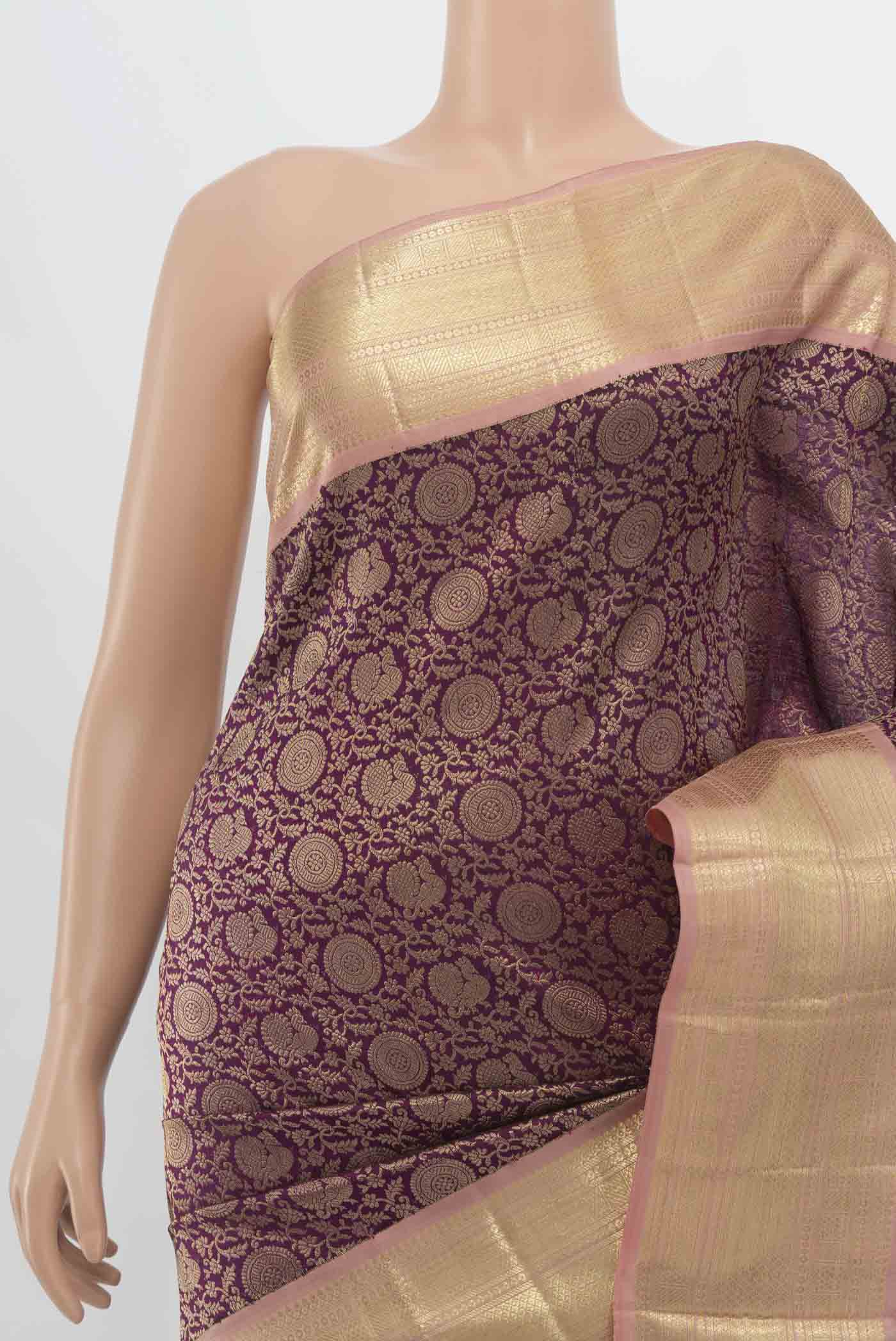 Border image of Purple Kanchipuram Silk Saree with Zari Butta on the body and Silk Border. 