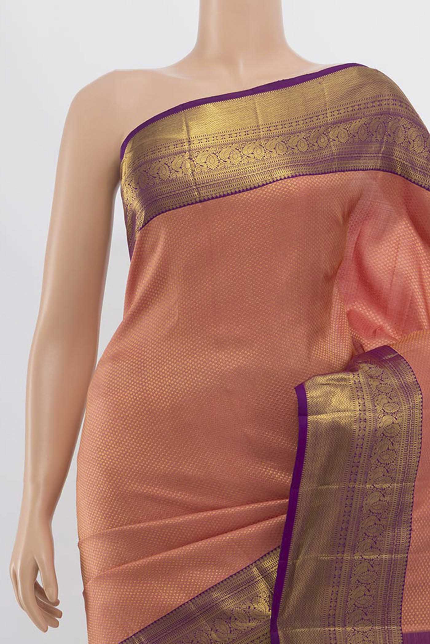 Border image of Peach Kanchipuram Silk Saree with Zari Butta on the body and Silk Border. 