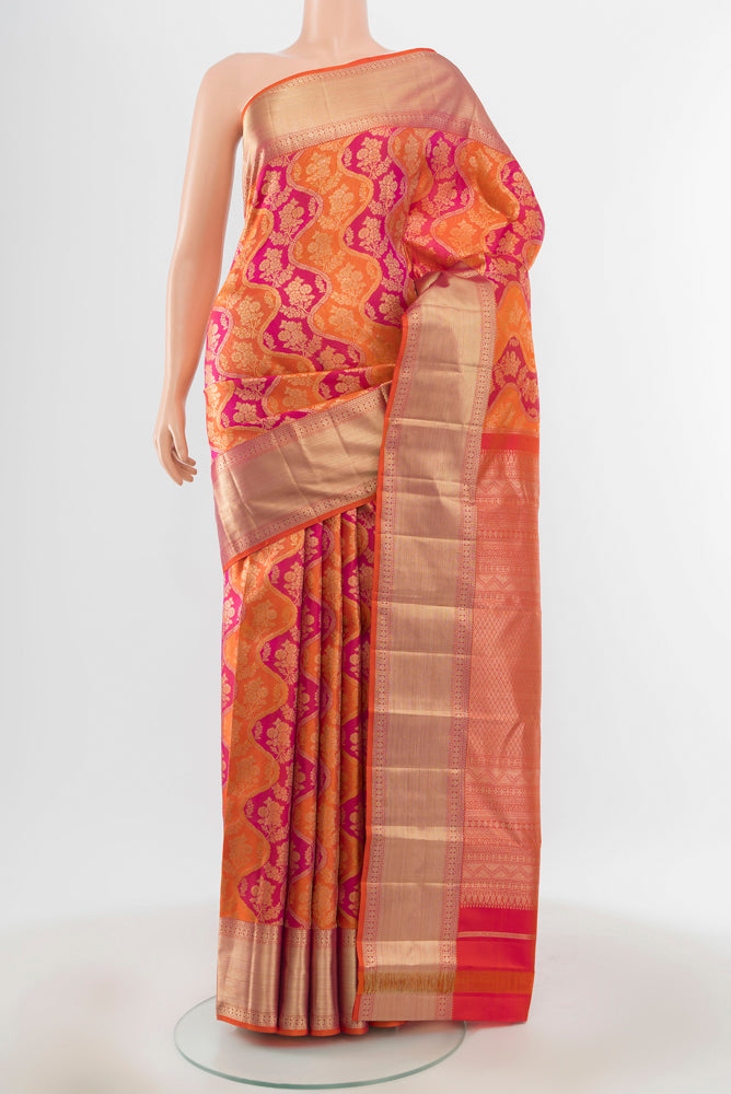 Pure Silk Pure Zari Multi Color Kanjivaram Saree with Zari Butta on the body and Silk Border.  displayed on a mannequin