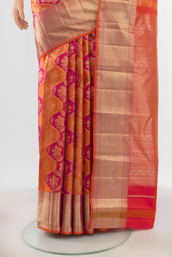 Pleats and pallu of Pure Silk Pure Zari Multi Color Kanjivaram Saree with Zari Butta on the body and Silk Border. 