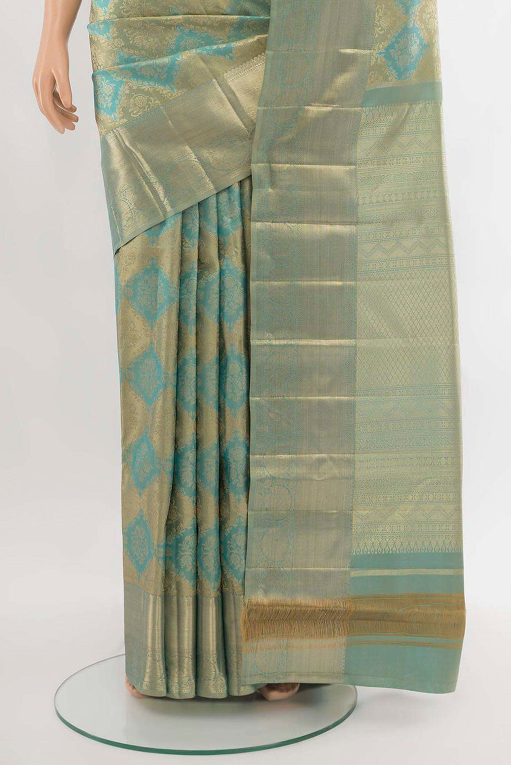 Pleats and pallu of Sky Blue Kanjivaram Silk Saree with Zari Butta on the body and Silk Border. 
