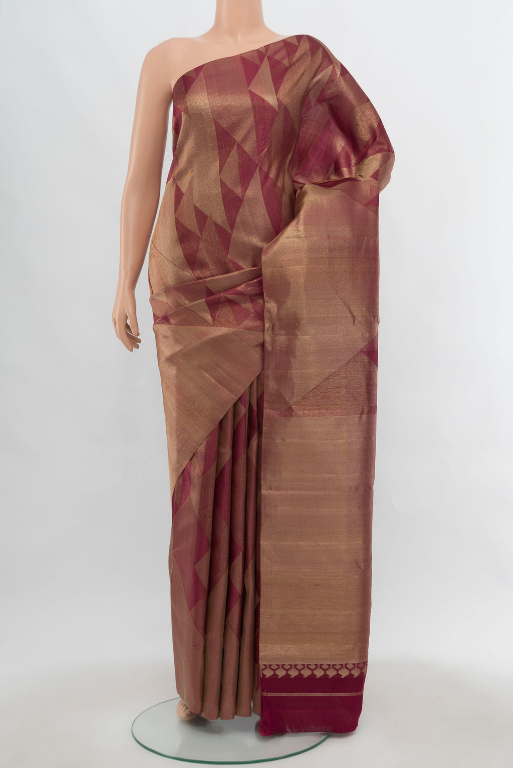 Golden Kanjivaram Silk Saree with Zari Butta on the body and Silk Border.  displayed on a mannequin