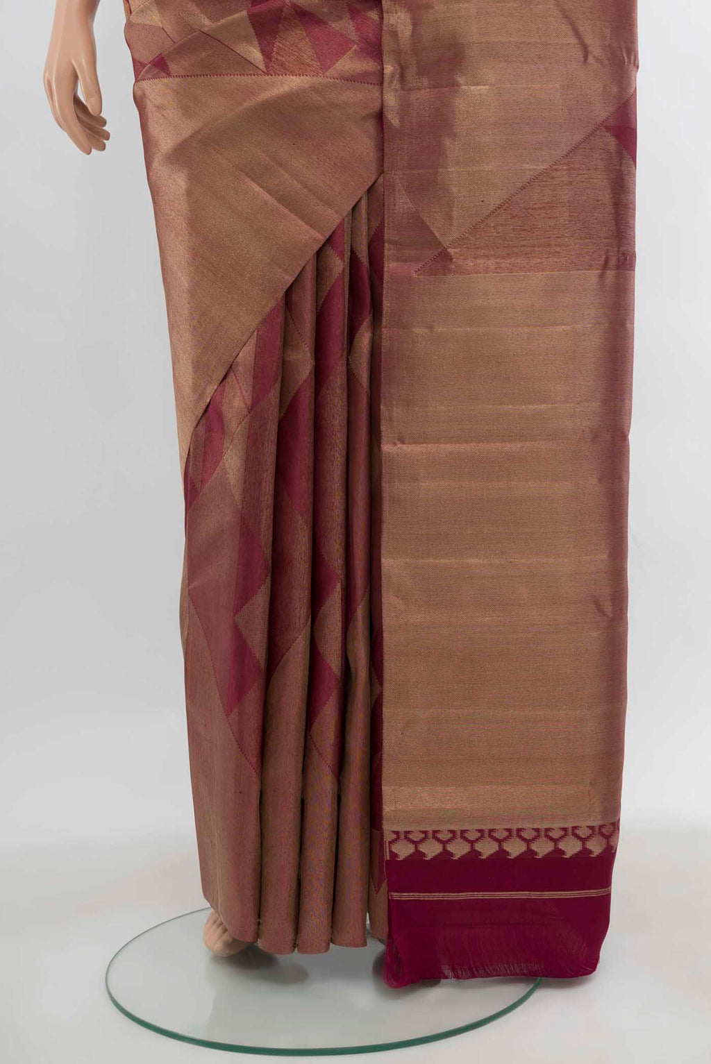 Pleats and pallu of Golden Kanjivaram Silk Saree with Zari Butta on the body and Silk Border. 