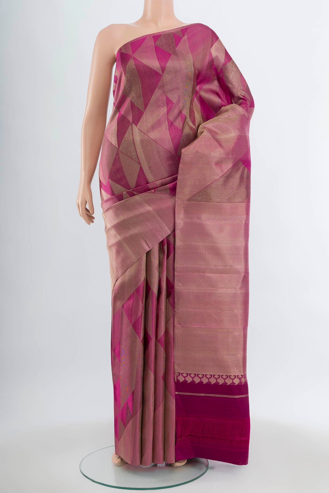 Purple Kanjivaram Silk Saree with Zari Butta on the body and Silk Border.  displayed on a mannequin