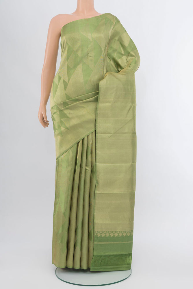 Pista Green Kanjivaram Silk Saree with Zari Brocade on the body and Silk Border.  displayed on a mannequin