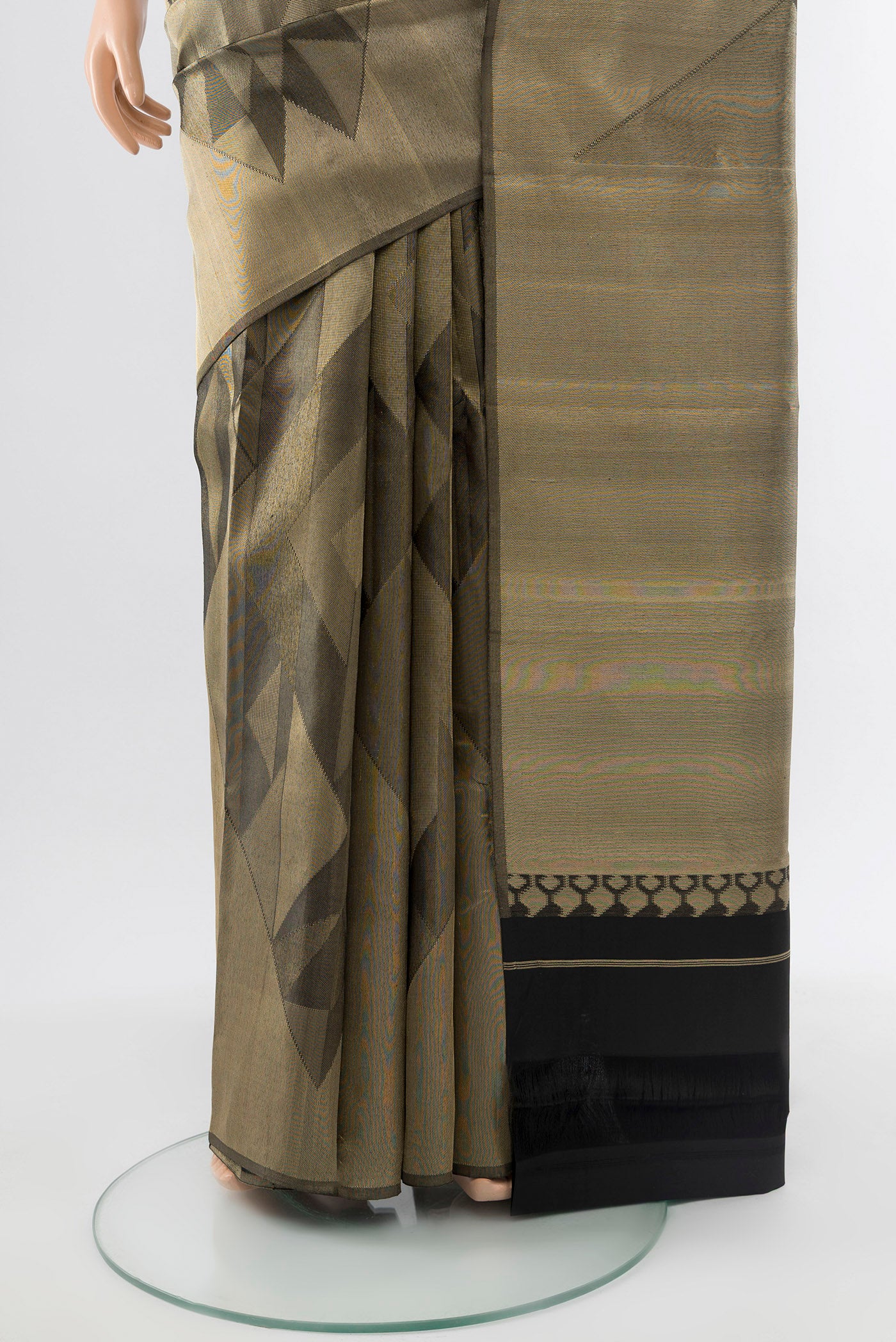 Pleats and pallu of Golden Kanjivaram Silk Saree with Zari Butta on the body and Silk Border. 