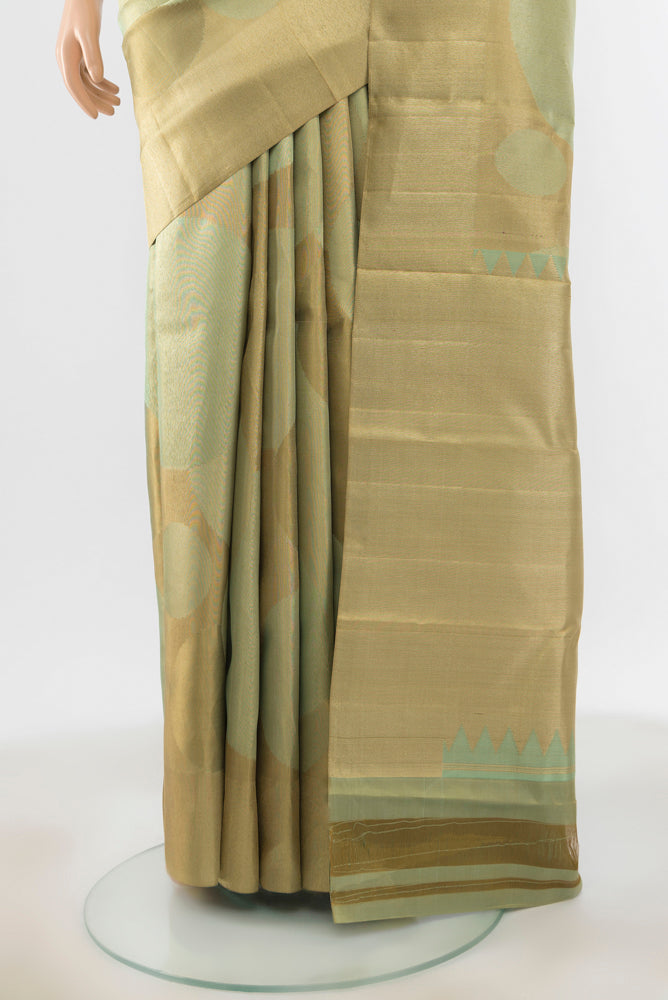 Pleats and pallu of Golden Kanjivaram Silk Saree with Zari Brocade on the body and Silk Border. 