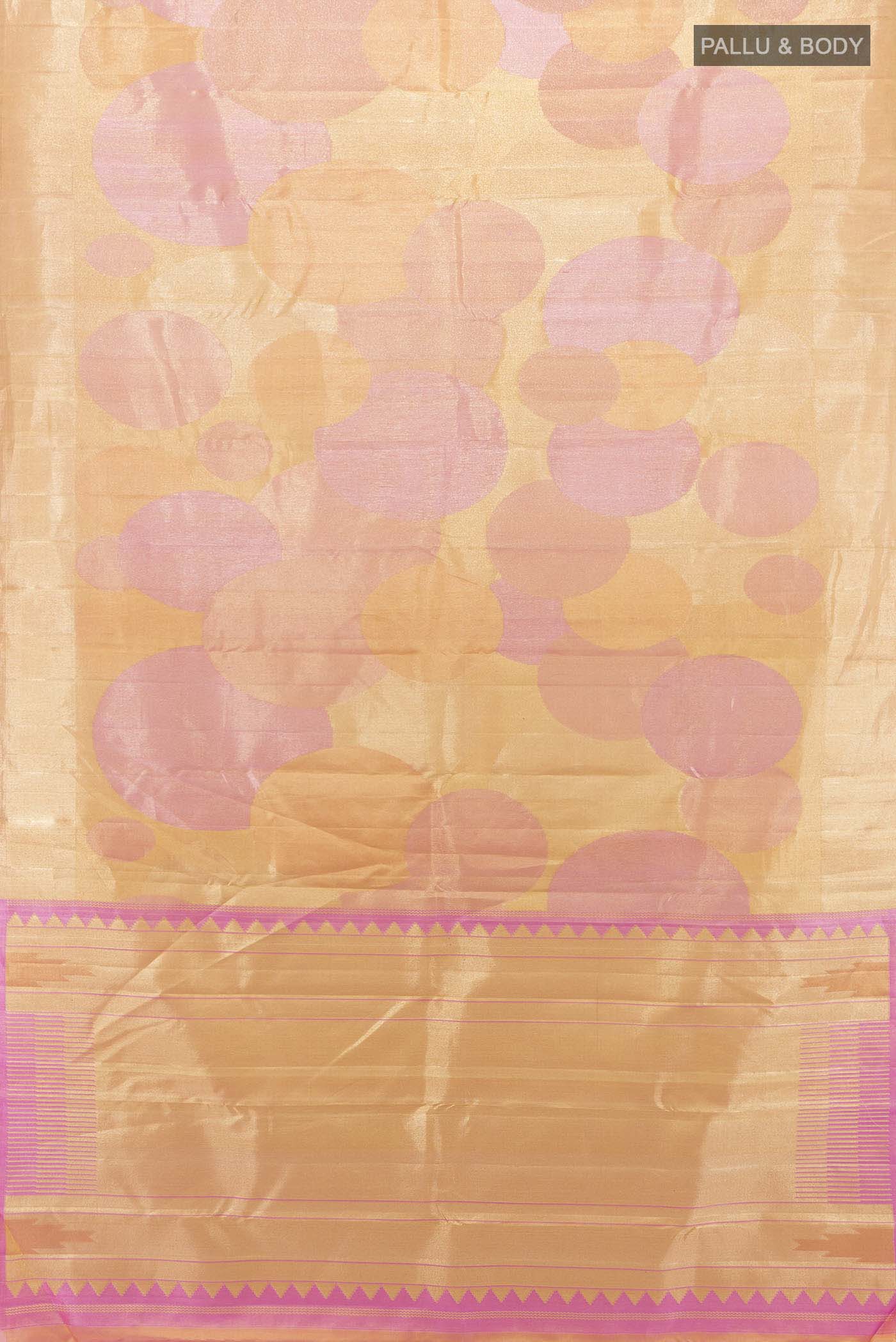 Flat view of Rose Gold Kanjivaram Silk Saree with Zari Butta on the body and Silk Border. 