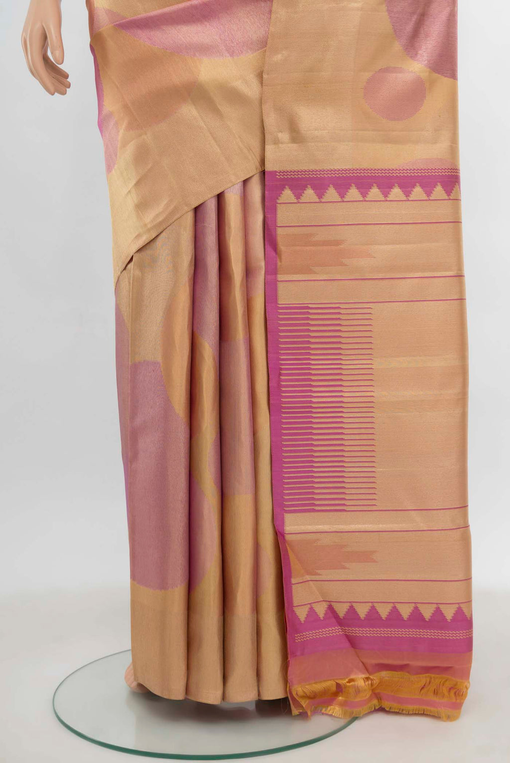 Pleats and pallu of Rose Gold Kanjivaram Silk Saree with Zari Butta on the body and Silk Border. 