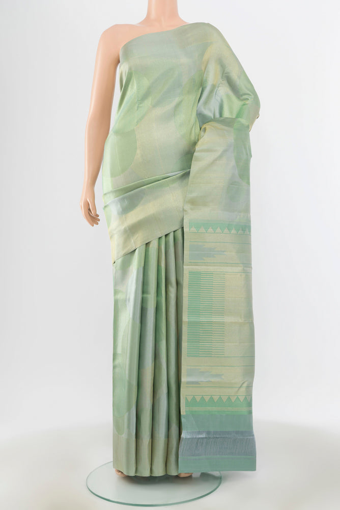 Golden Kanjivaram Silk Saree with Zari Brocade on the body and Silk Border.  displayed on a mannequin