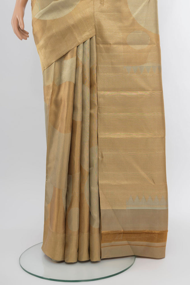 Pleats and pallu of Golden Kanjivaram Silk Saree with Zari Brocade on the body and Zari Border. 
