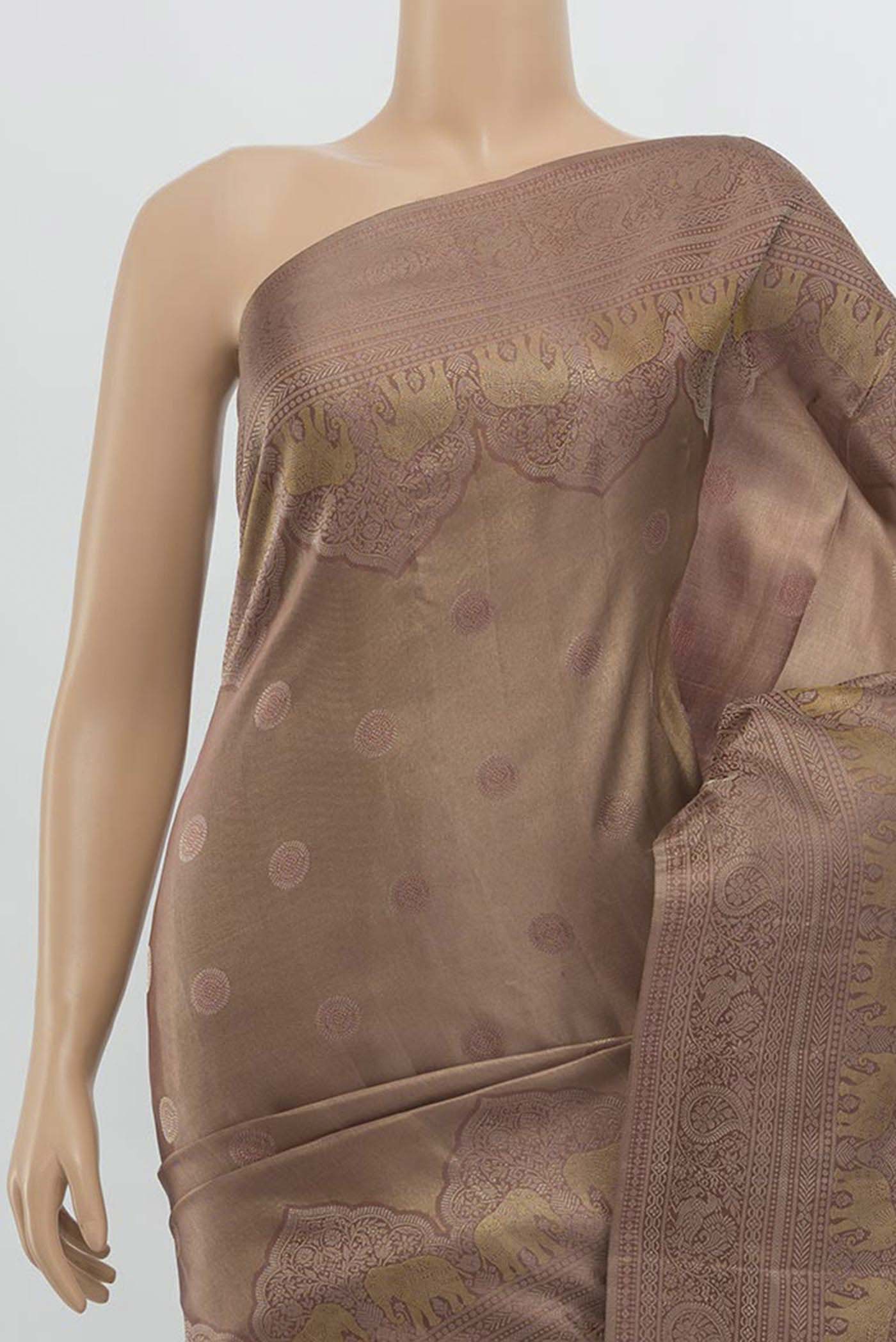Border image of Dark Beige Kanjivaram Silk Saree with Zari Butta on the body and Silk Border. 