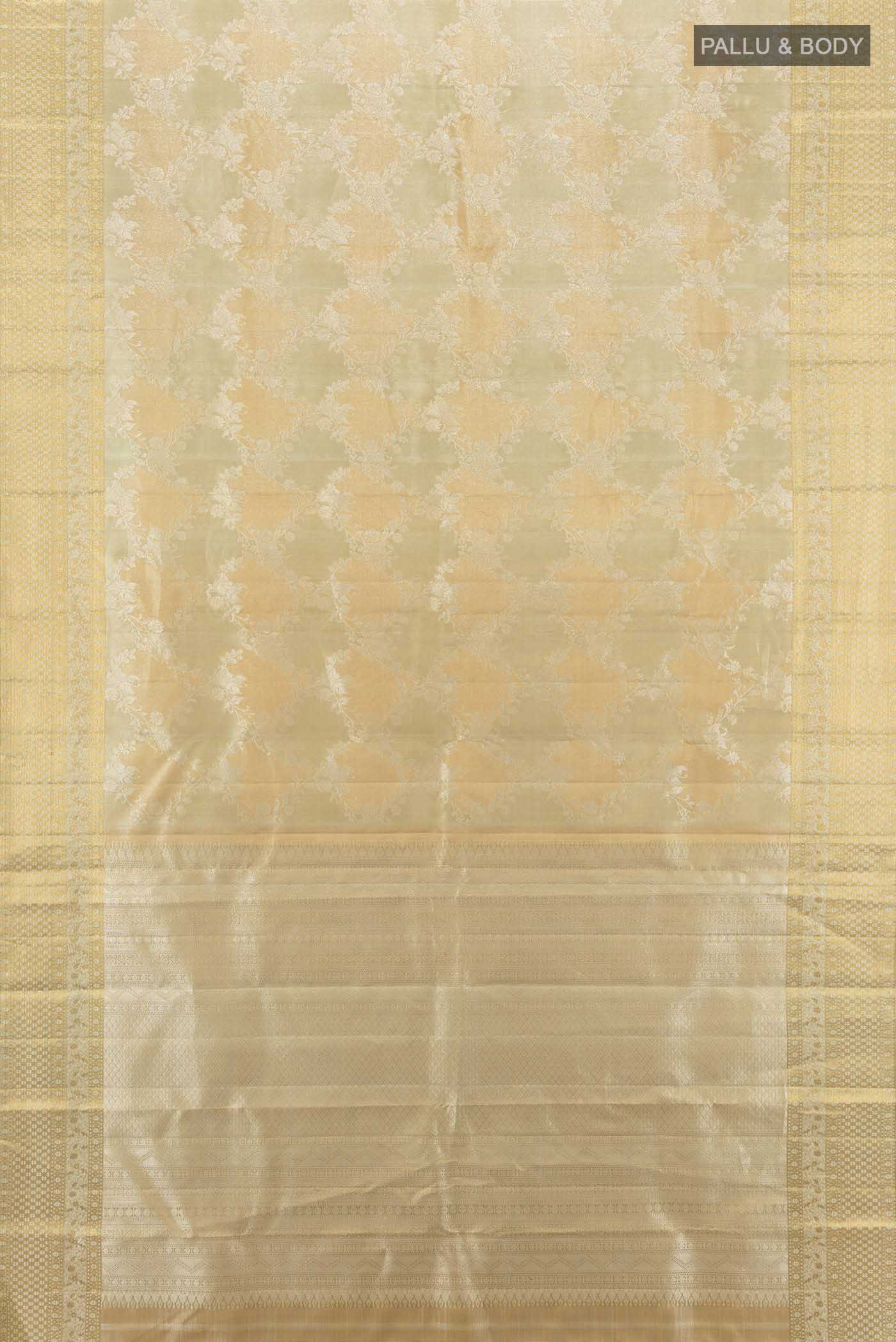 Flat view of Golden Kanjivaram Silk Saree with Zari Butta on the body and Silk Border. 