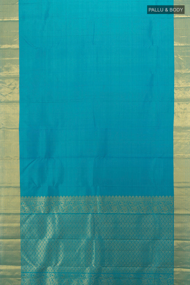 Flat view of Light Blue Kanjivaram Silk Saree with Zari Butta on the body and Silk Border. 