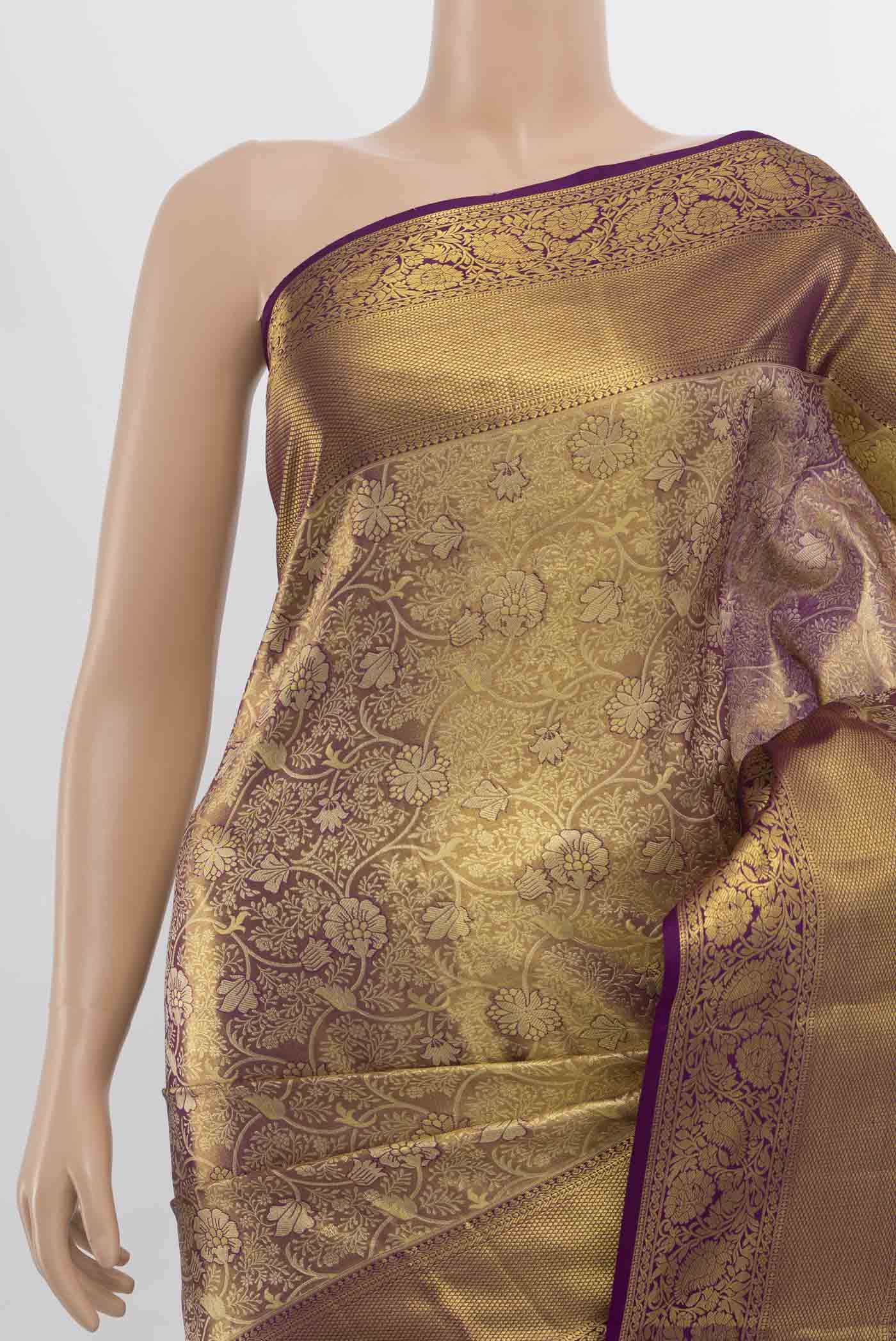 Border image of Golden Kanchipuram Silk Saree with Zari Butta on the body and Silk Border. 