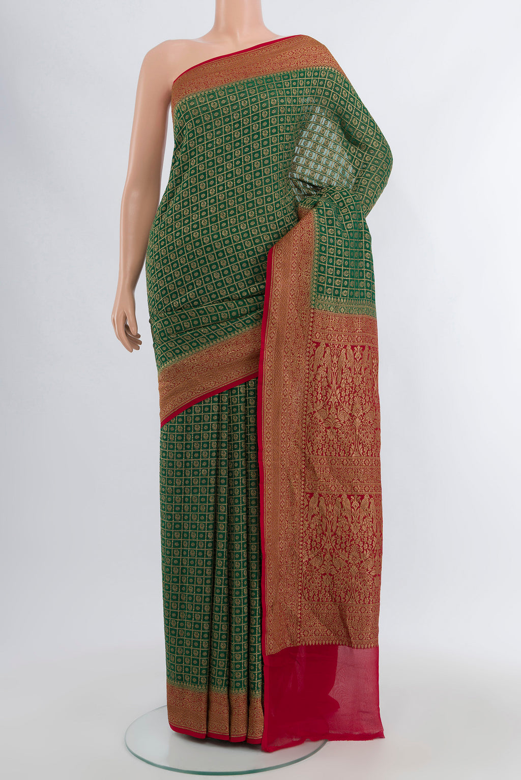 Mint Green Banarasi Georgette Saree with Zari Butta on the body and Silk Border.  displayed on a mannequin