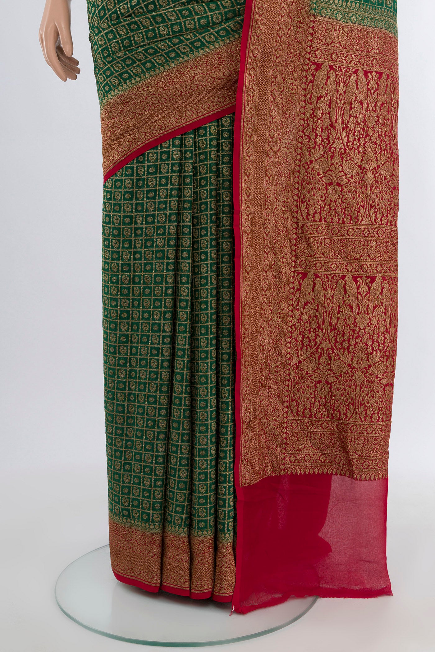 Pleats and pallu of Mint Green Banarasi Georgette Saree with Zari Butta on the body and Silk Border. 