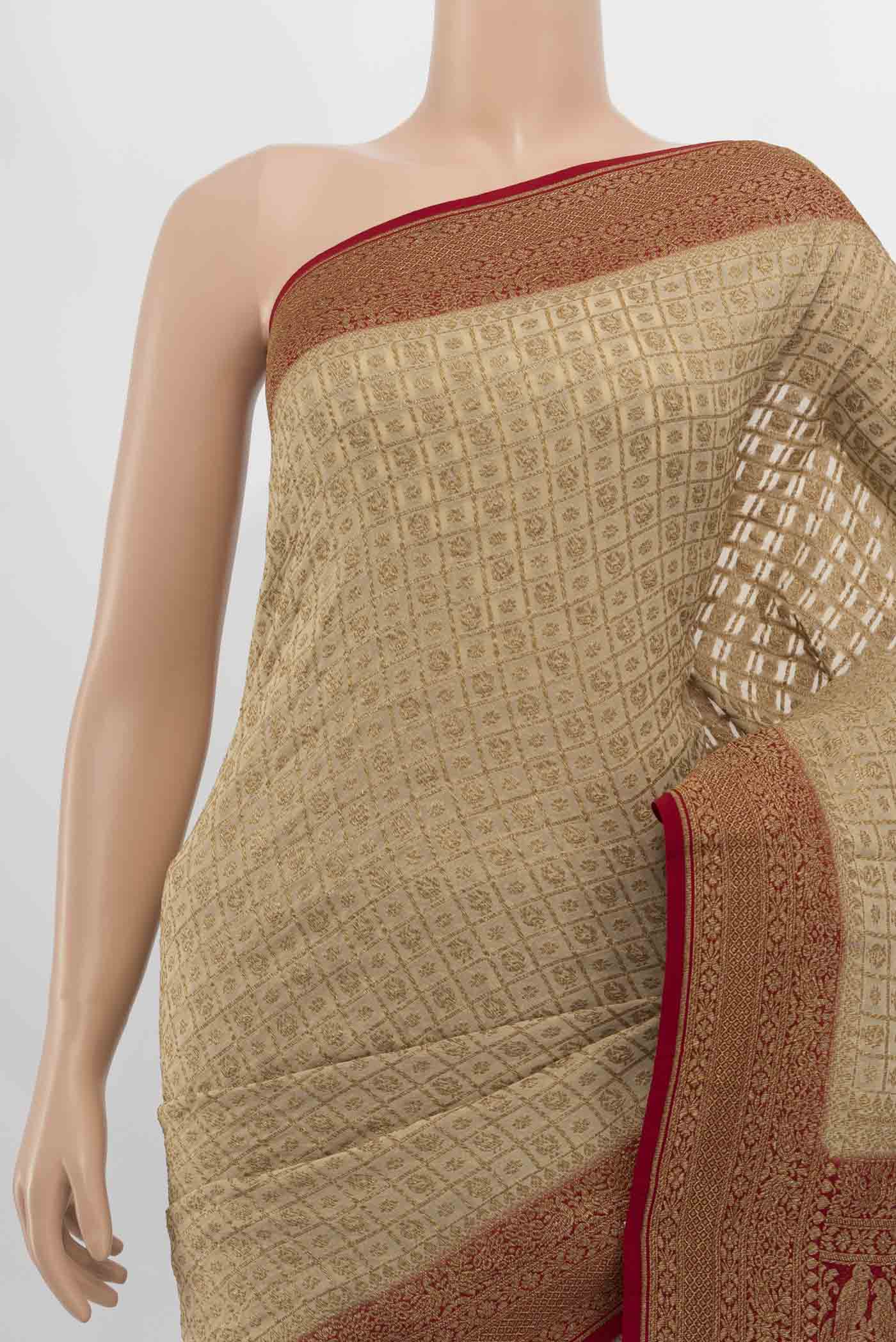 Border image of Cream Banarasi Georgette Saree with Zari Butta on the body and Silk Border. 