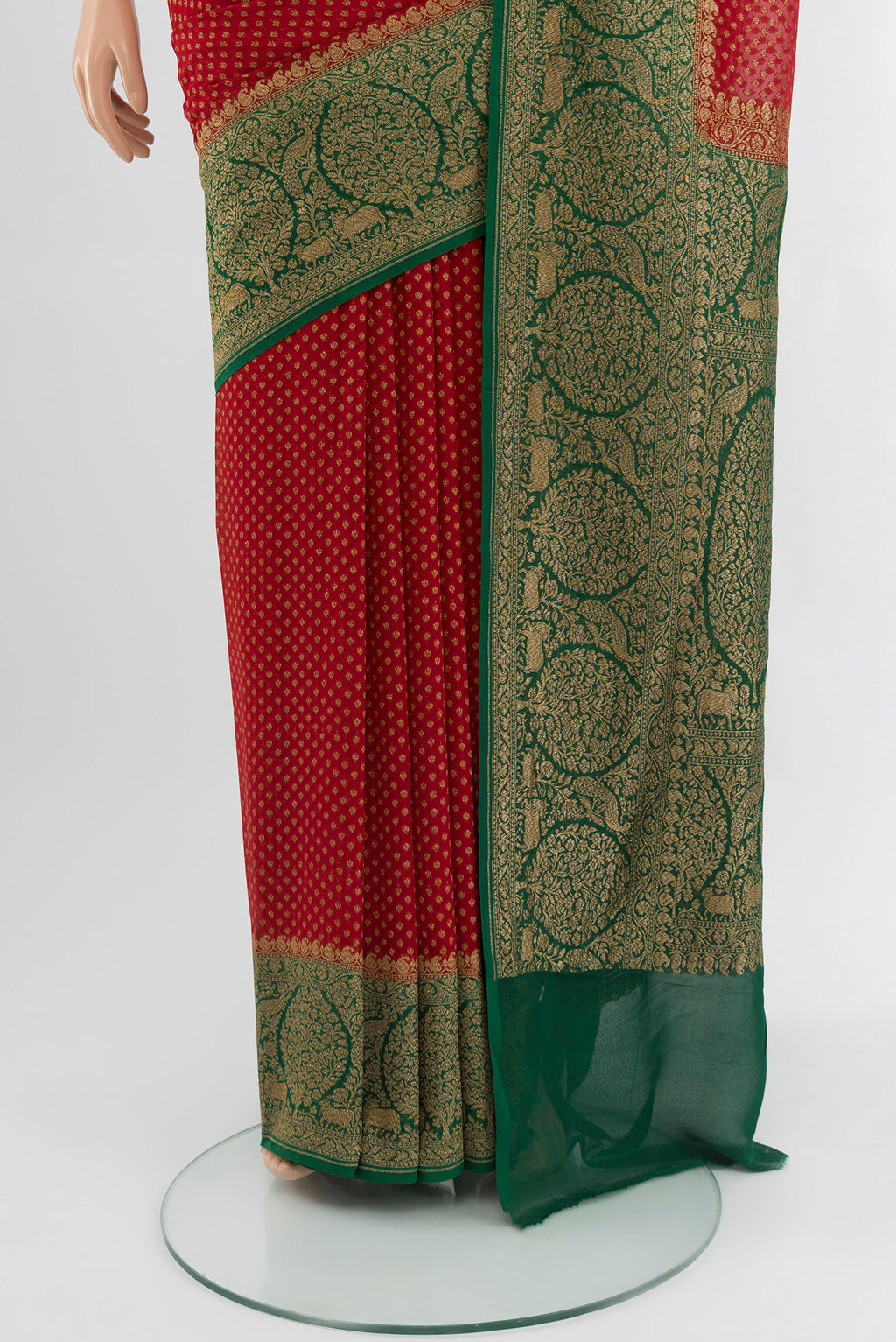 Pleats and pallu of Red Banarasi Georgette Saree with Zari Butta on the body and Zari Border. 