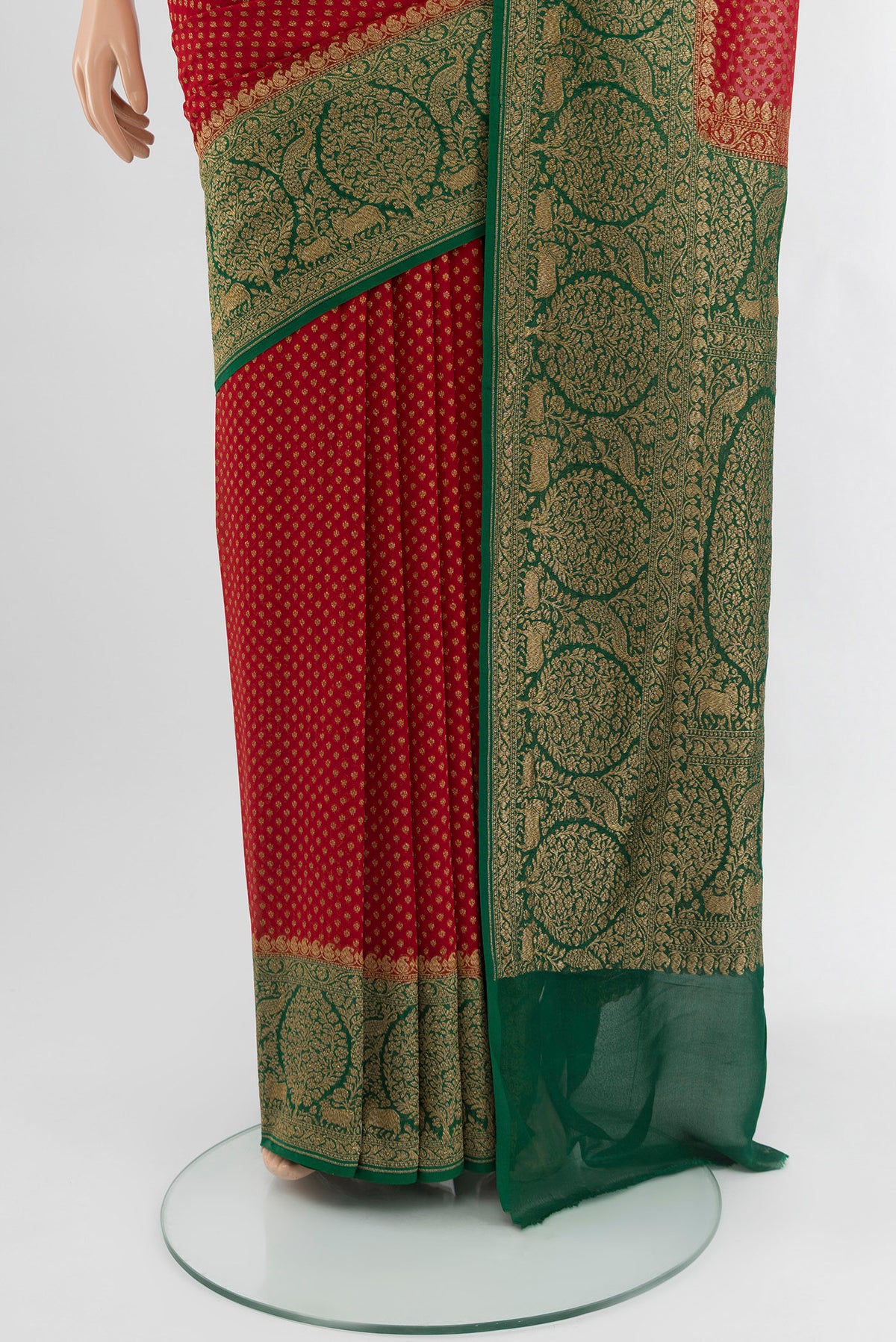 Pleats and pallu of Red Banarasi Georgette Saree with Zari Butta on the body and Zari Border. 