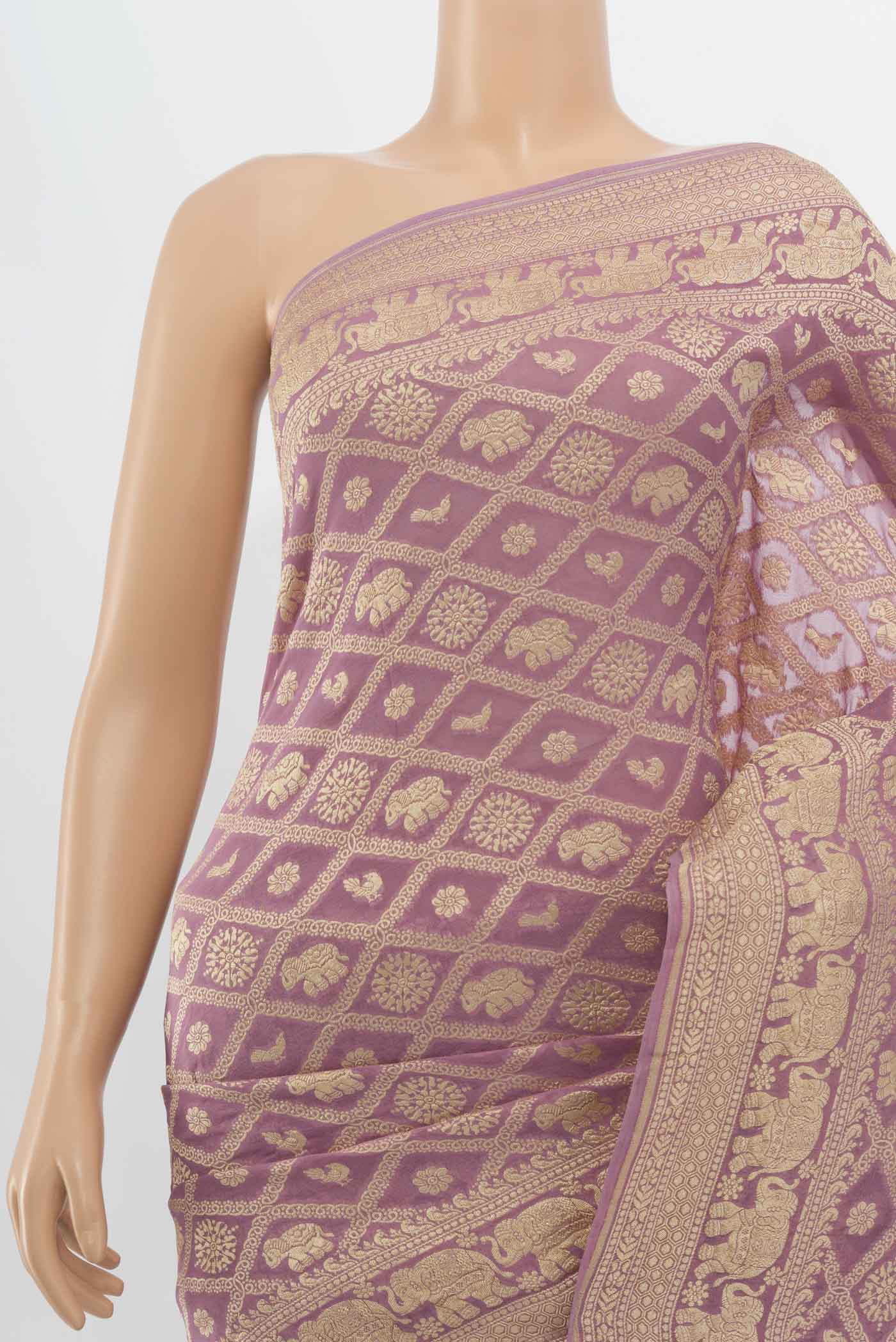 Border image of Golden Banarasi Georgette Saree with Zari Butta on the body and Silk Border. 