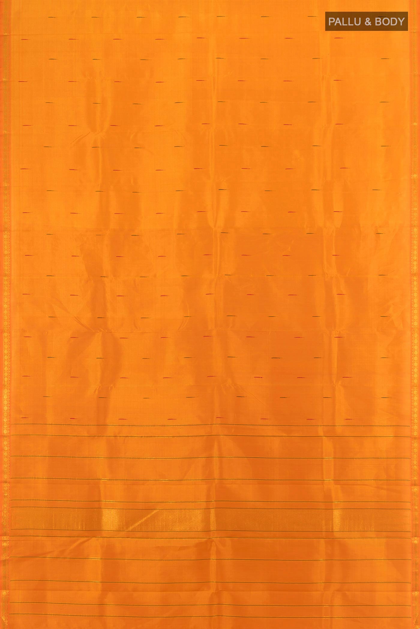 Flat view of Brick Orange Kanchipuram Silk Saree with Zari Butta on the body and Zari Border. 