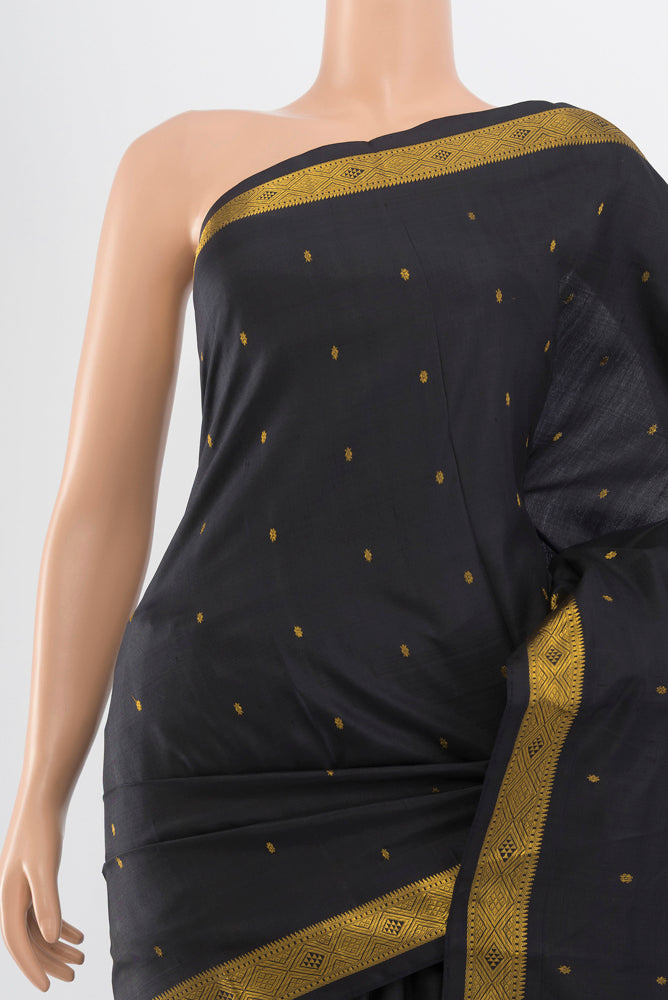 Border image of Pure Silk Pure Zari Black Kanchipuram Saree with Zari Butta on the body and Silk Border. 