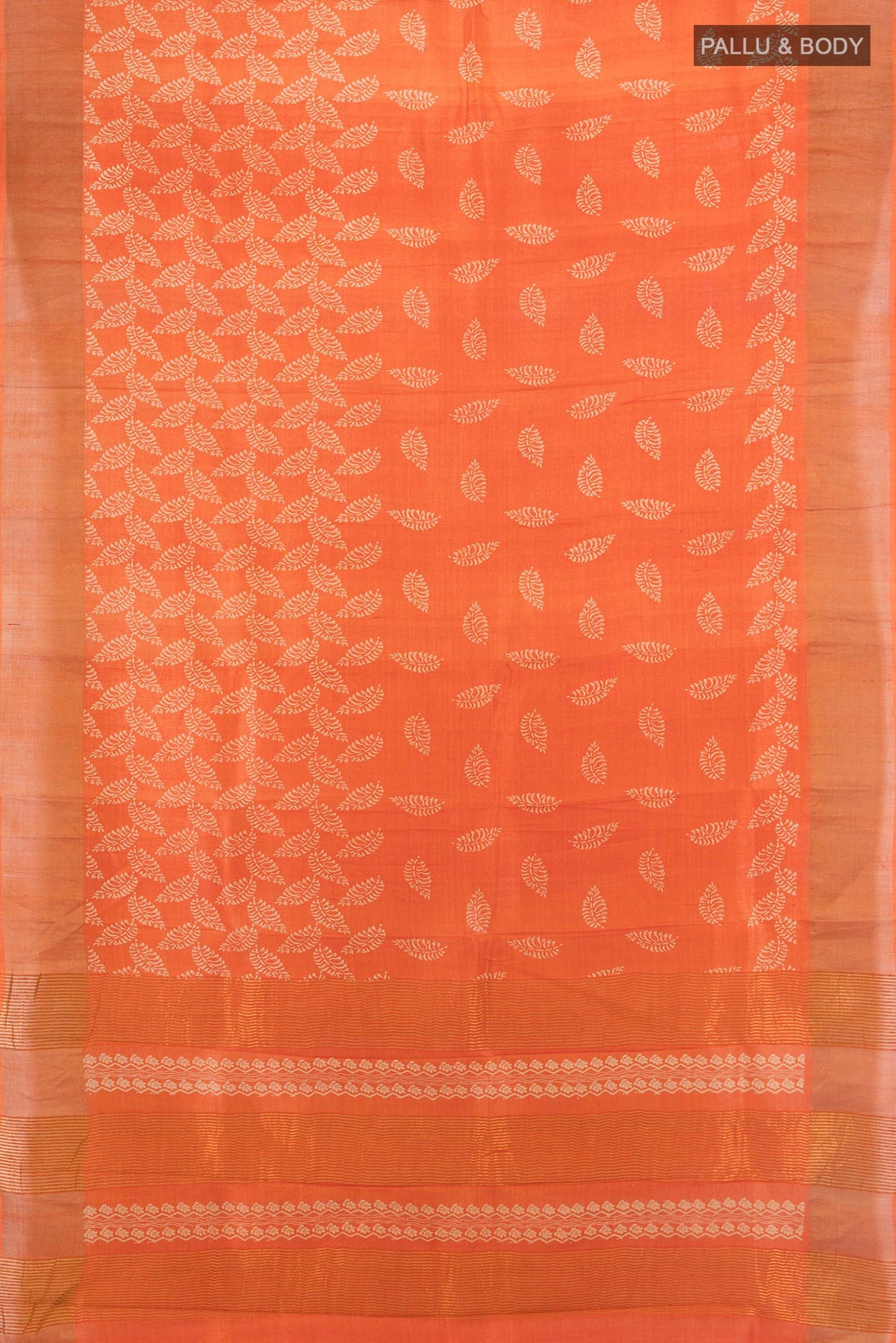Flat view of Orange Tussar Saree with Floral Print on the body and Zari Border. 