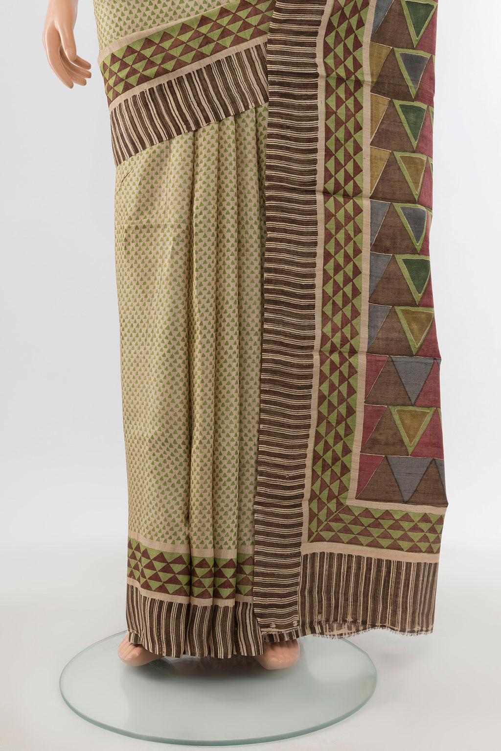 Pleats and pallu of Beige Tussar Silk Saree with Floral Print on the body and Printed Border. 